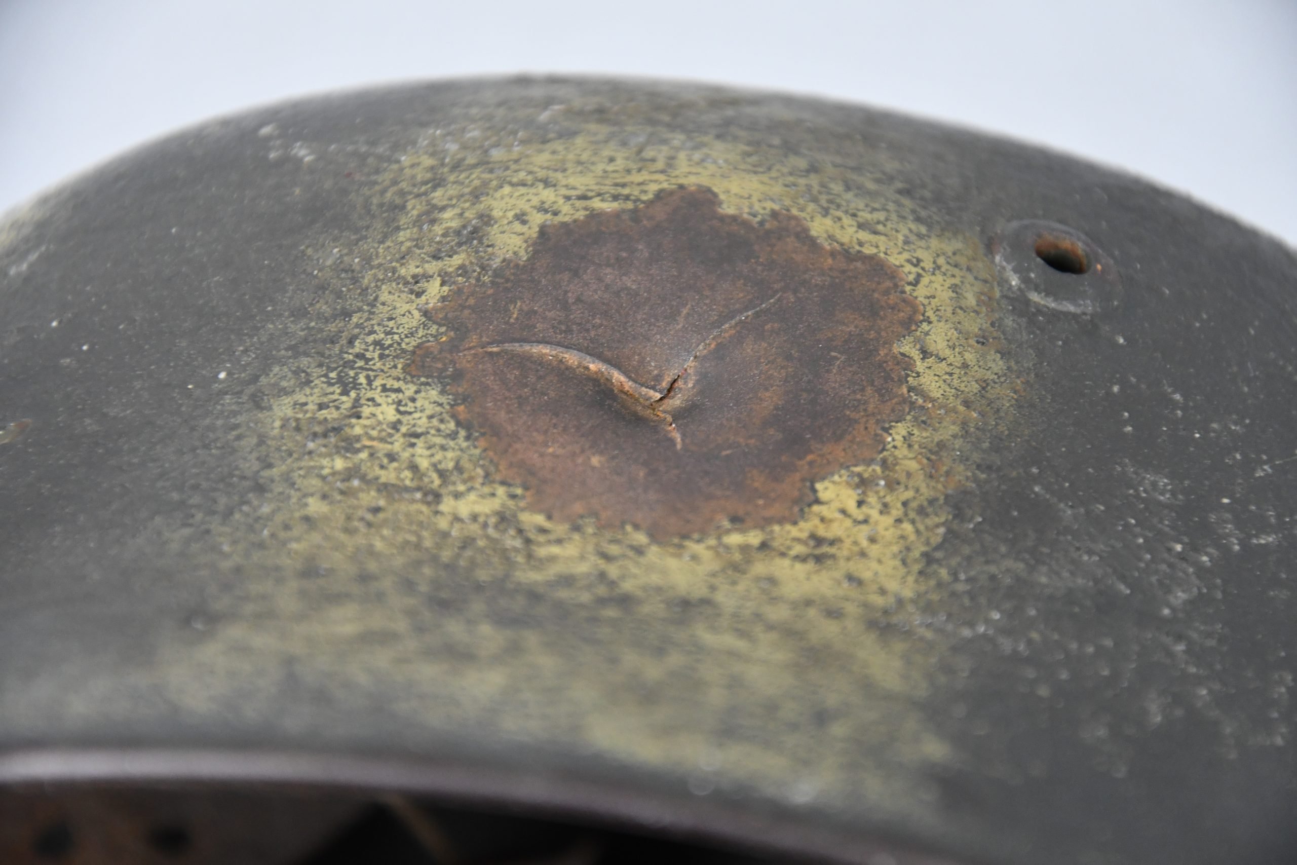 M35 army (Heer) reissued single decal camouflage steel helmet with bullet hit — image 23
