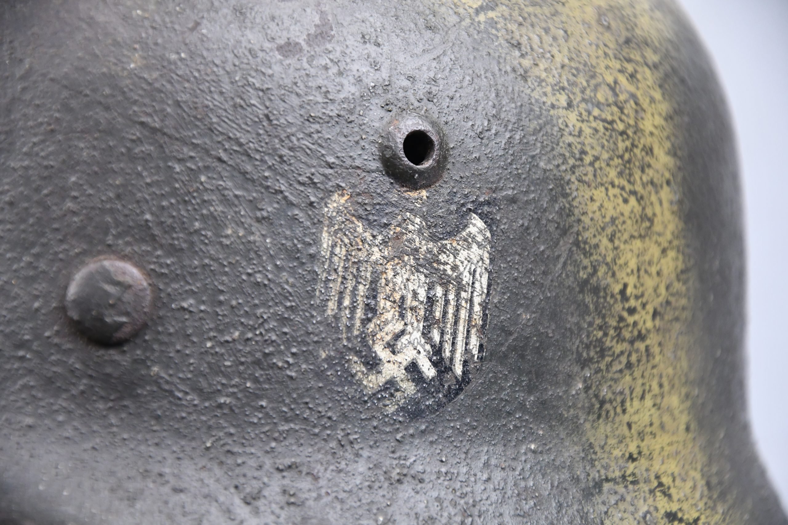 M35 army (Heer) reissued single decal camouflage steel helmet with bullet hit — image 3