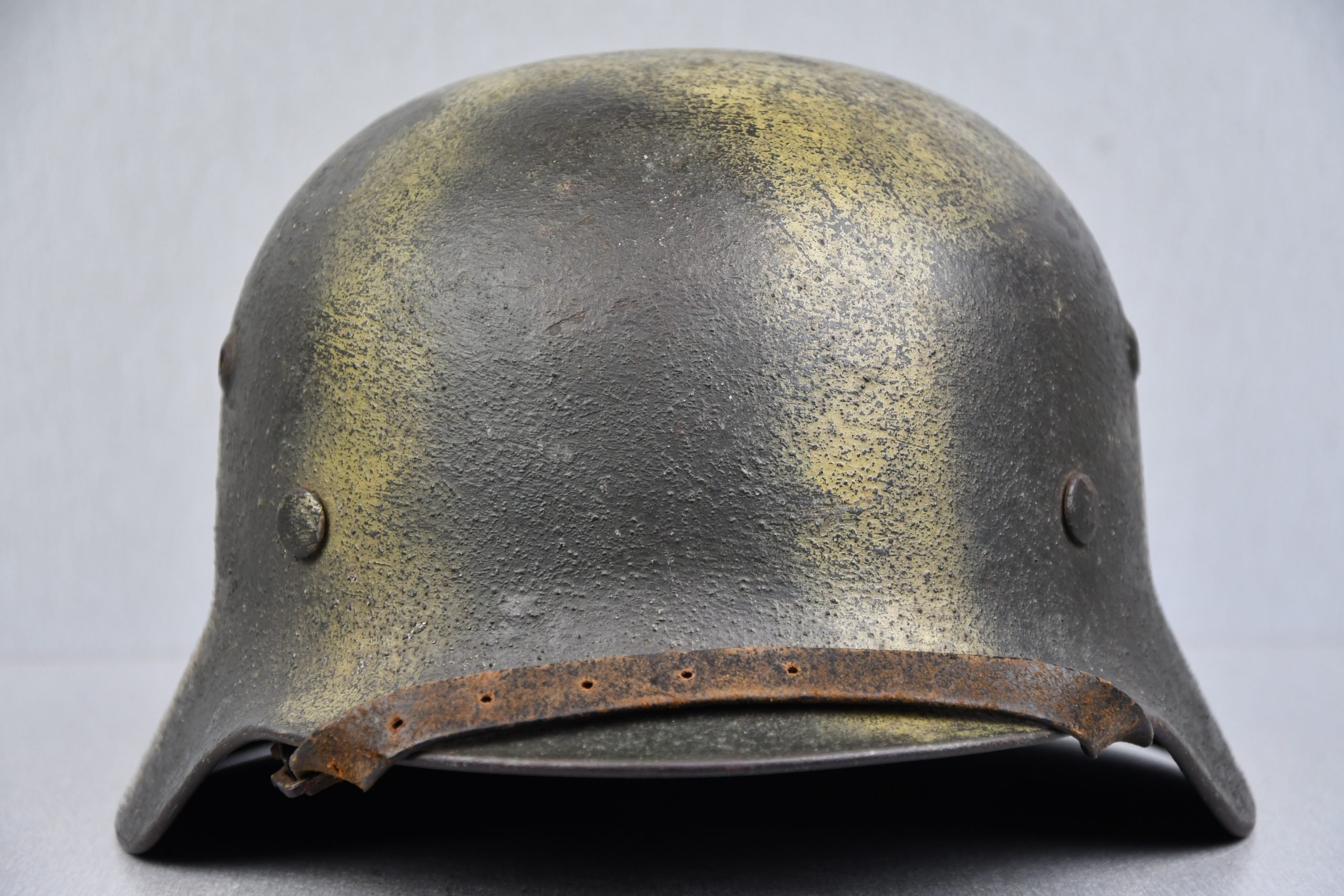 M35 army (Heer) reissued single decal camouflage steel helmet with bullet hit — image 4