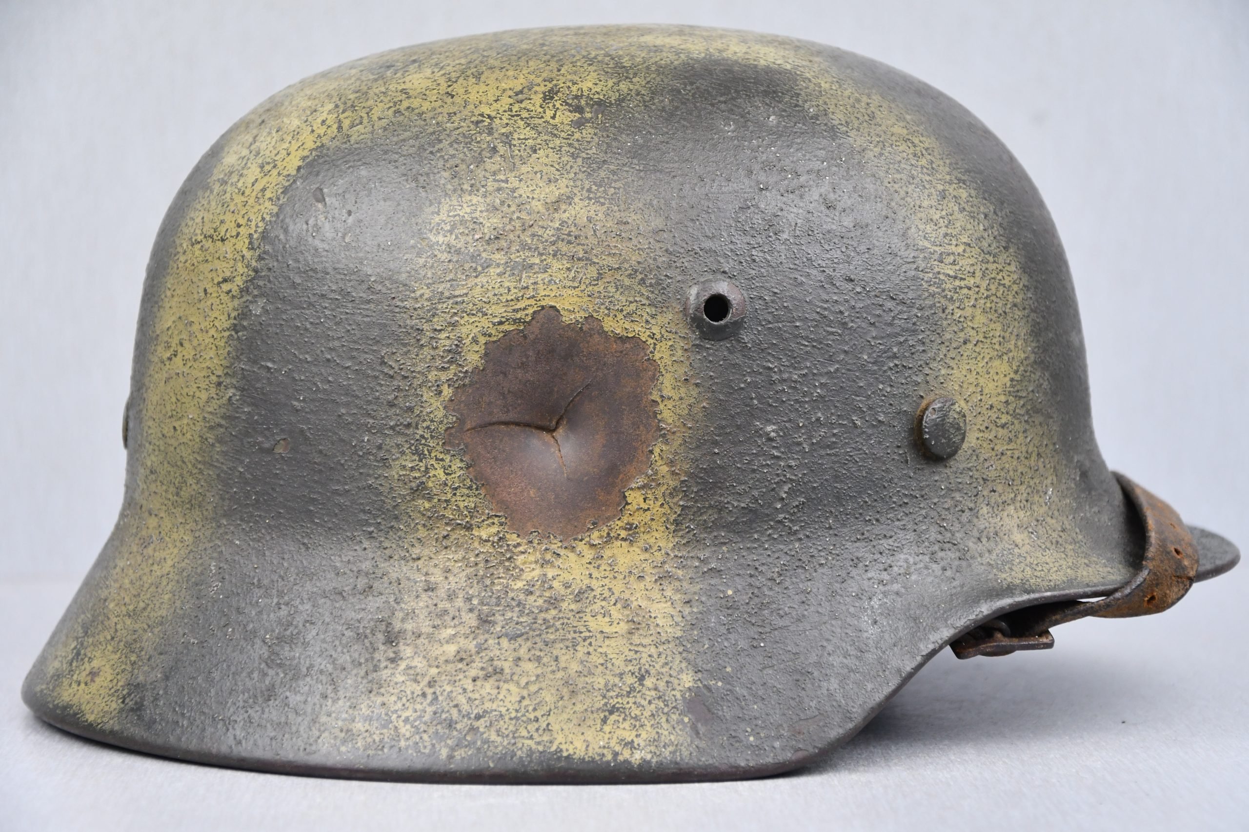 M35 army (Heer) reissued single decal camouflage steel helmet with bullet hit — image 5