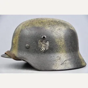 M35 army (Heer) reissued single decal camouflage steel helmet with …