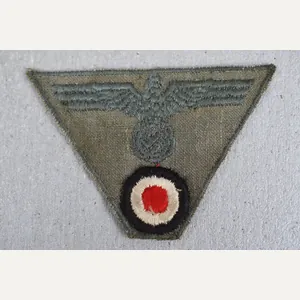 M44 army (Heer) embroidered trapezoid cap insignia