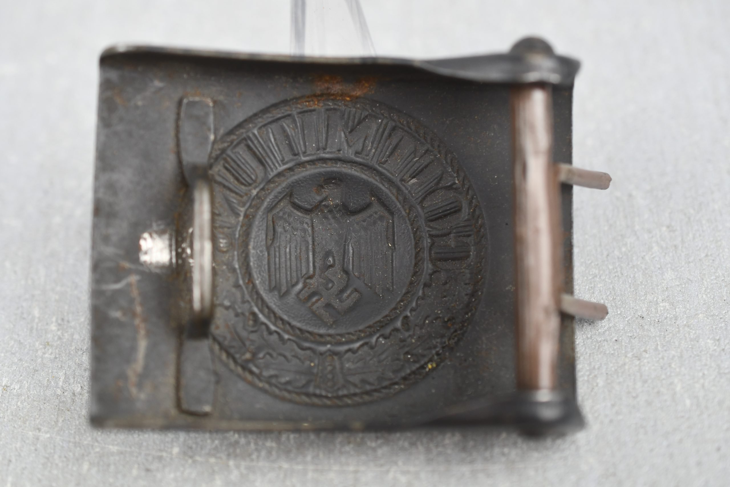 Late war grey army/navy belt buckle by J.F.S. — image 2