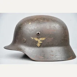 Early M35 Luftwaffe double decal steel helmet with droop tail …