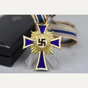 Mother's cross in gold with box by C.E. Juncker