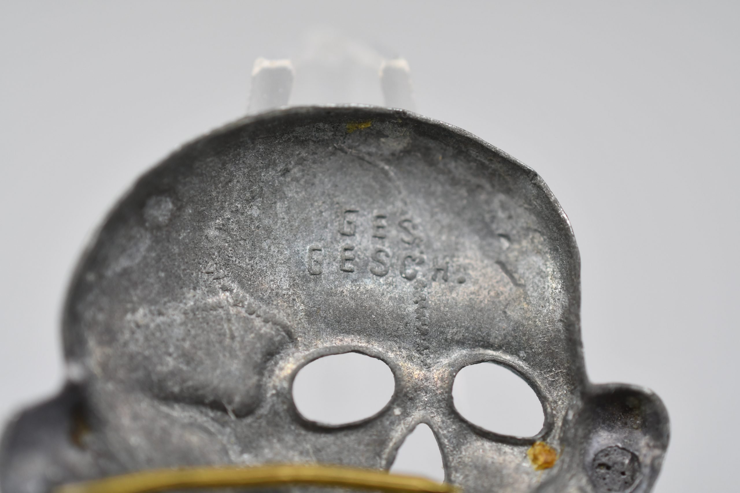 SS visor cap skull 'Totenkopf' marked 'Ges. Gesch.' by E.W. Assmann & Sohne — image 3