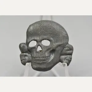 SS visor cap skull 'Totenkopf' marked 'Ges. Gesch.' by E.W. …