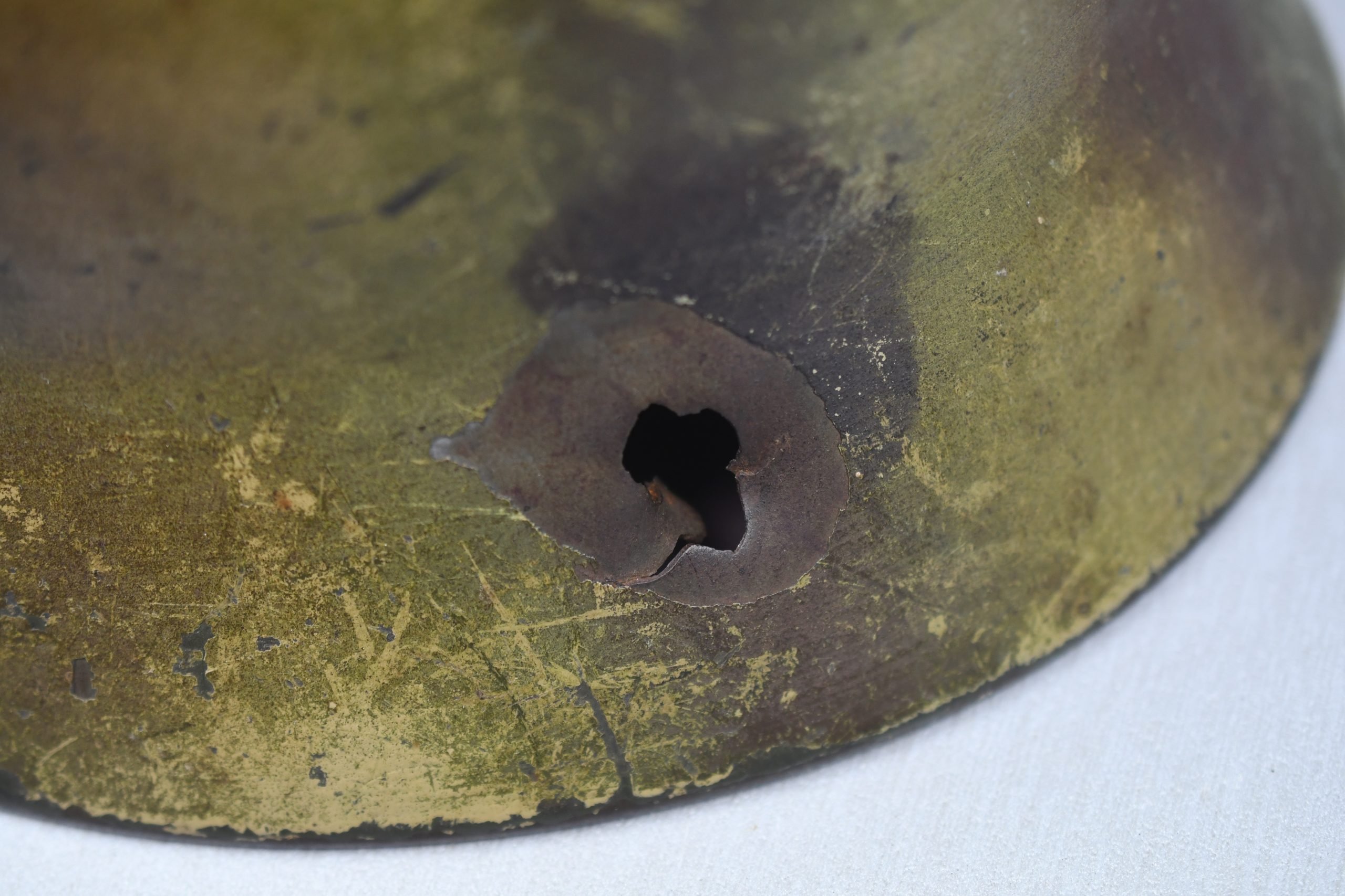 M35 Army (Heer) three tone 'Normandy' camouflage helmet EF62 bullet hit — image 11