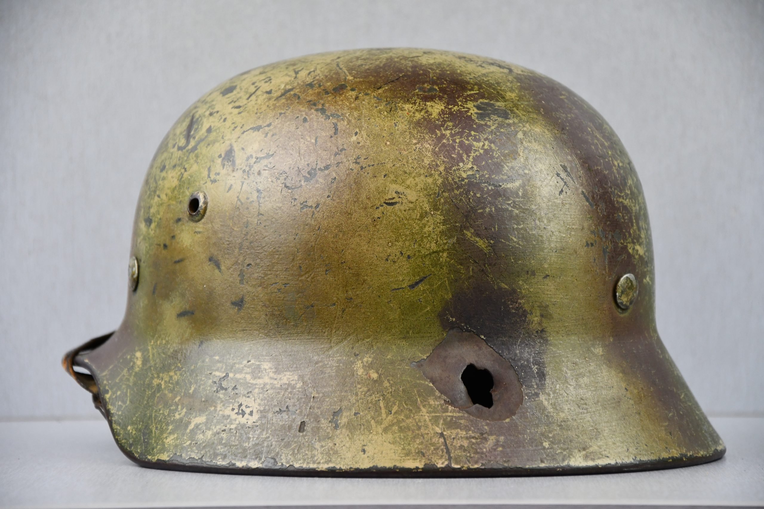 M35 Army (Heer) three tone 'Normandy' camouflage helmet EF62 bullet hit — image 3