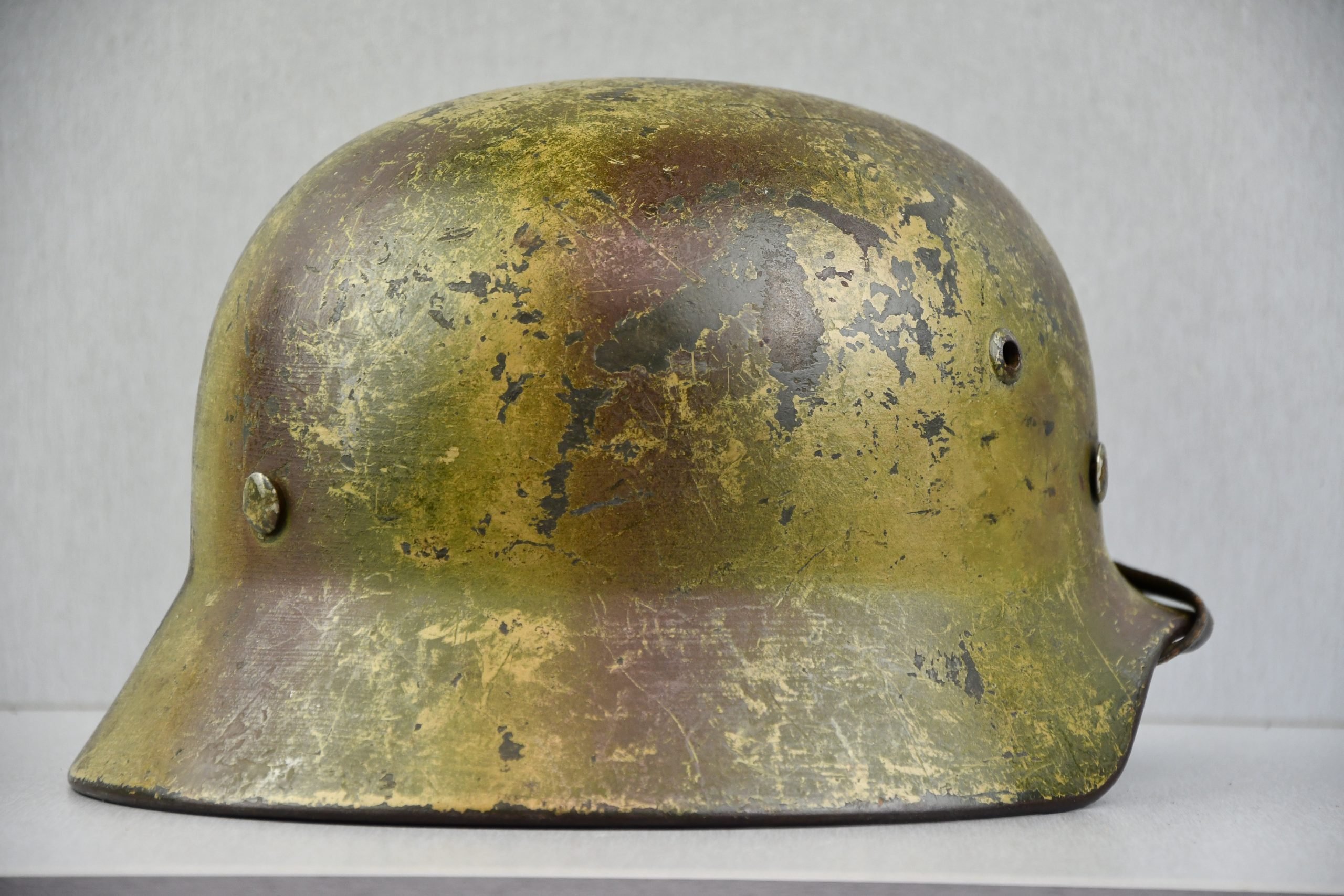M35 Army (Heer) three tone 'Normandy' camouflage helmet EF62 bullet hit — image 5