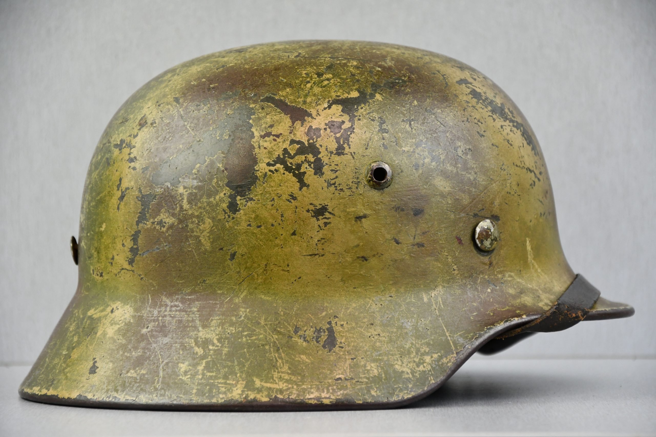 M35 Army (Heer) three tone 'Normandy' camouflage helmet EF62 bullet hit — image 6