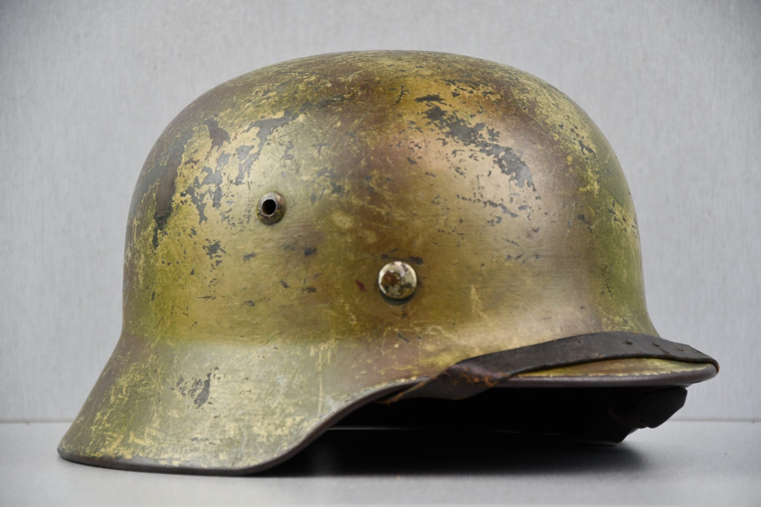 M35 Army (Heer) three tone 'Normandy' camouflage helmet EF62 bullet hit — image 7