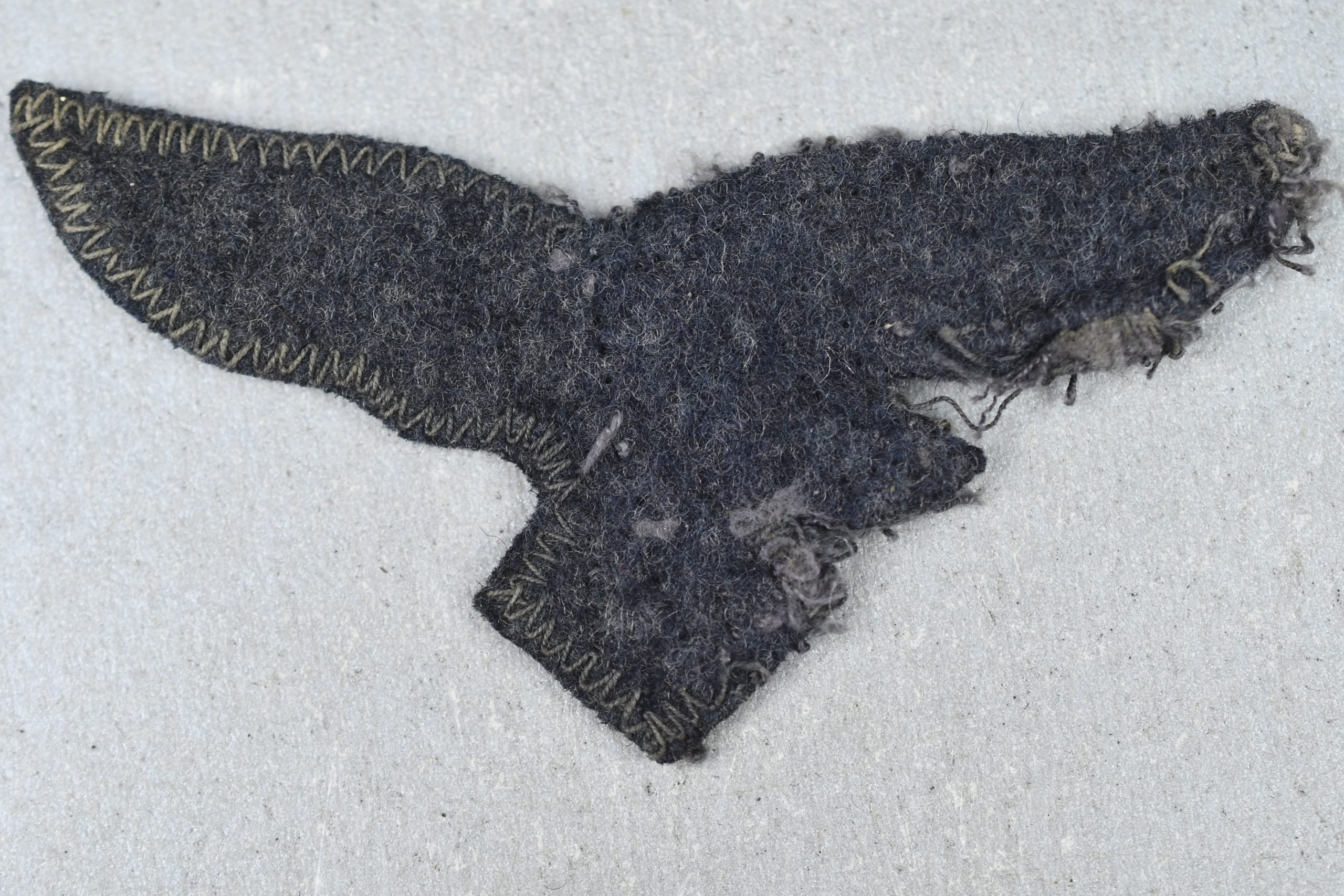 Uniform removed 'cut-off' Luftwaffe breast eagle — image 2