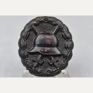 German WW1 black wound badge 'DRGM' marked