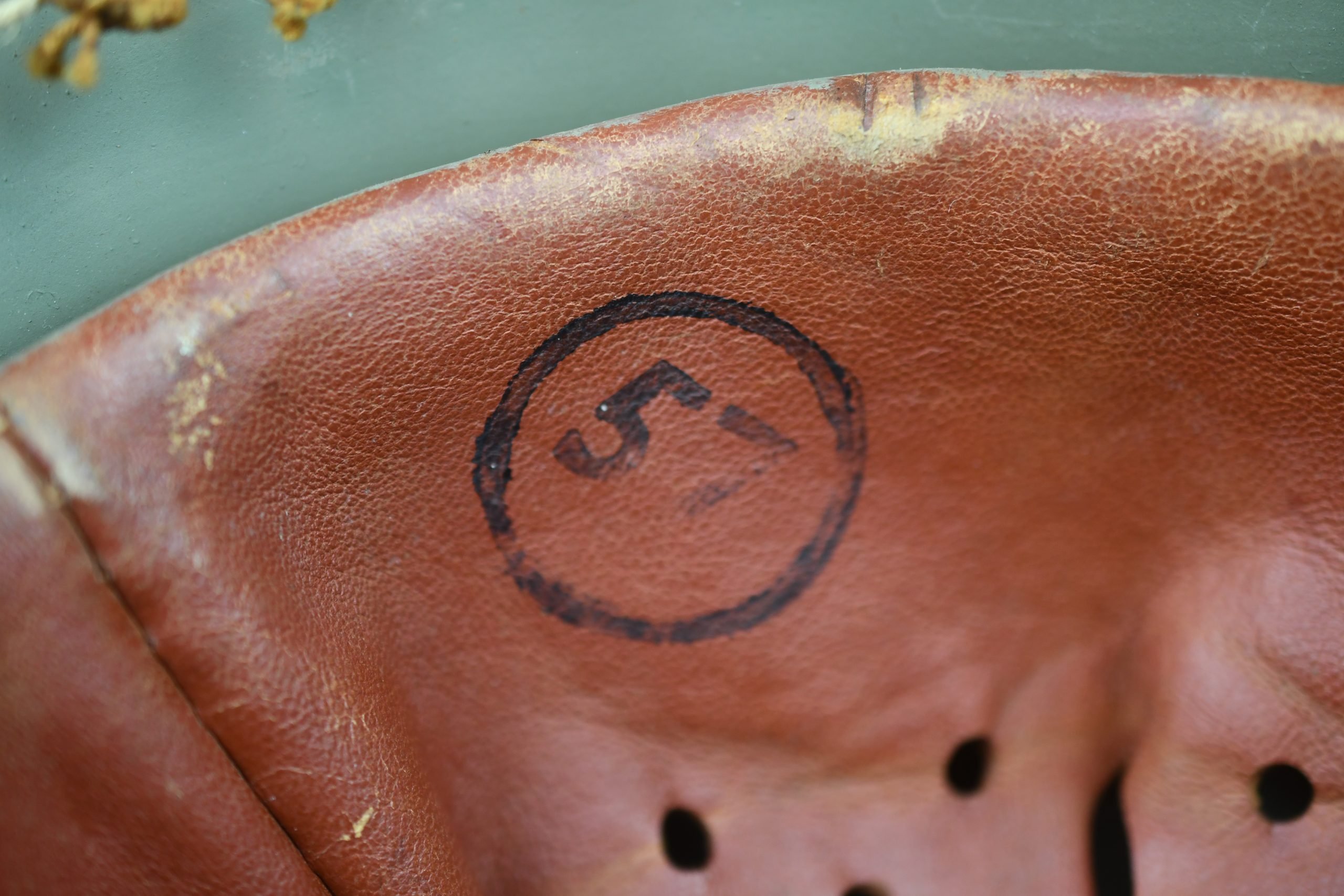 M40 Norwegian reissued steel helmet ET64 with camouflage net — image 13