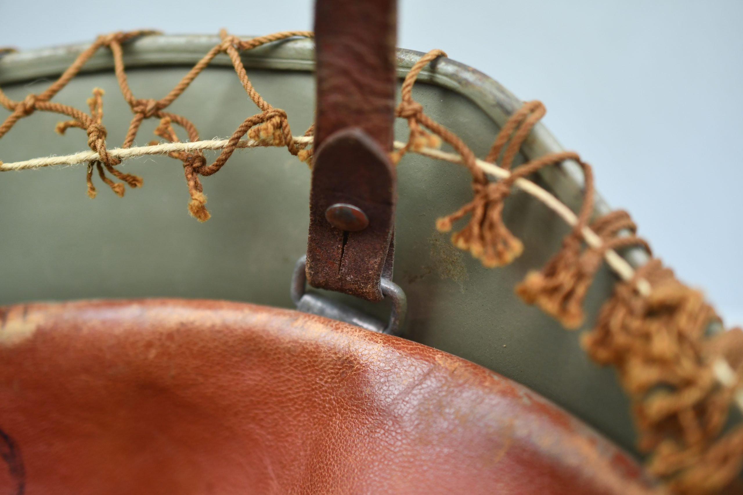 M40 Norwegian reissued steel helmet ET64 with camouflage net — image 16