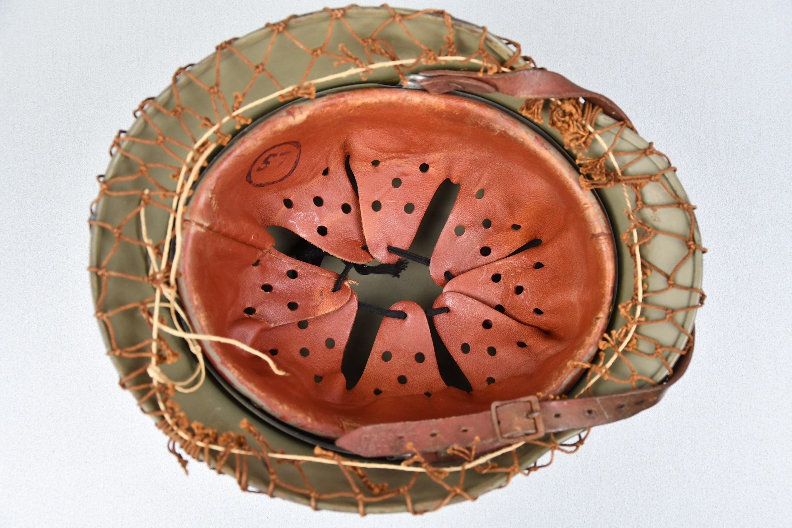 M40 Norwegian reissued steel helmet ET64 with camouflage net — image 8