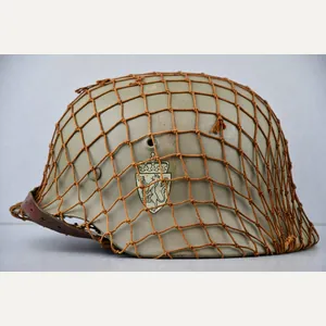 M40 Norwegian reissued steel helmet ET64 with camouflage net