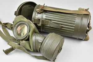 Reissued short M31 gas mask canister with straps and bakelite …