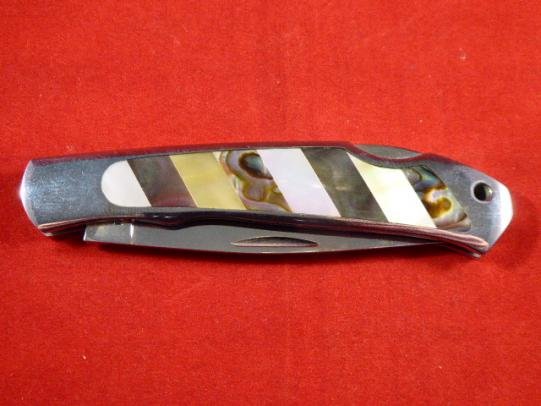 MOKI Lock Back Knife with a Beautiful White Pearl & Abalone Shell Inlayed Handle with Black Canvas & Leather Pouch. Circa 1999 — image 9