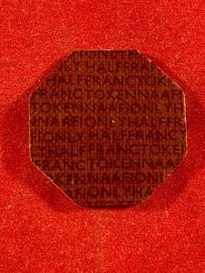 Near Mint WW2 NAAFI 1/2 Franc Octangular Brown Bakelite Token