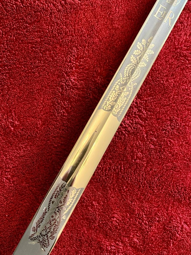 Near Mint ERII Royal Navy Officer's Sword by FIRMIN AND SONS PLC with Scabbard and Dress Knot c1980 — image 6