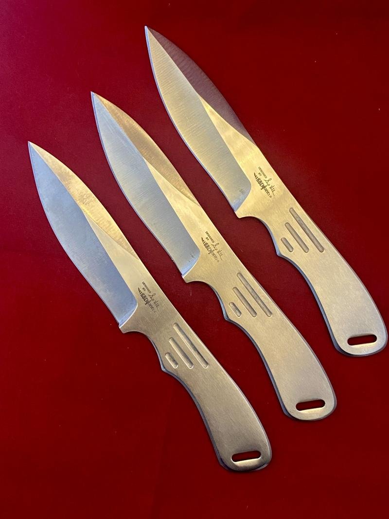 Mint Set of Three Gil Hibben Designed 8.6' Stainless Steel Throwing Knifes with Nylon Belt Sheath by United Cutlery, c2000 — image 2