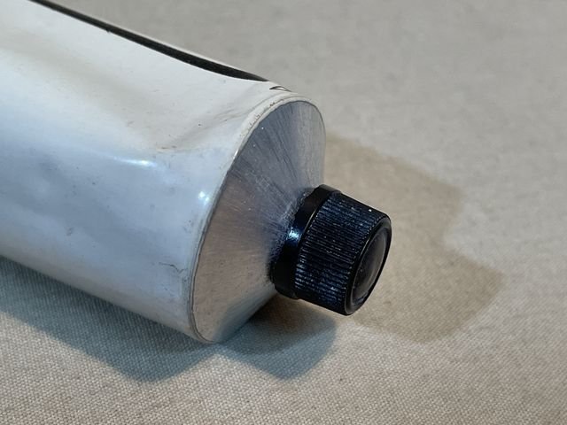 Original WWII German Medical Item, Unfilled Lebertranzinkpaste Metal Tube (Tan) — image 9