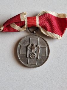 Womens Bow Ribbon Social Welfare Medal.