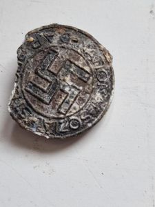 Dug up Button Hole Party Badge