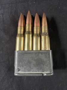 M1 GARAND CLIP WITH 8 X WW2 DATED .30-06 ROUNDS …