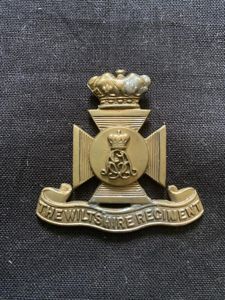 THE WILTSHIRE REGIMENT CAP BADGE