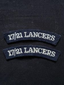 A SET OF 17/21 LANCERS SHOULDER TITLES