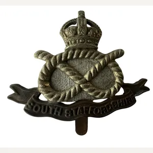 South Staffordshire Regiment cap badge with it's original 'HollandPatch' backing