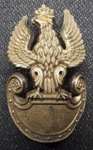Polish Economy Plastic Cap Badge.