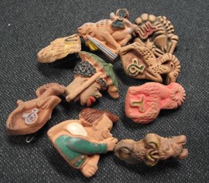 9 X WW2 German WHW Clay Pinback Donation Badges.