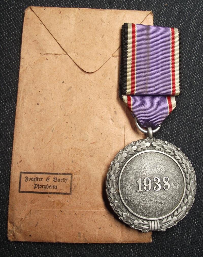 2nd Class Luftschutz Medal and Paper Packet of Issue. Foerster & Barth — image 2