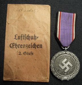 2nd Class Luftschutz Medal and Paper Packet of Issue. Foerster …