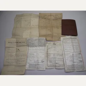 WW1 British Pay Book and Related Discharge Paperwork.