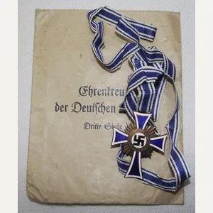 Bronze Mothers Cross with Paper Packet of Issue.