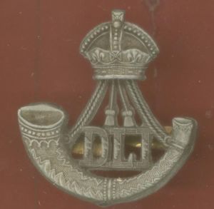 Durham Light Infantry WW2 plastic economy cap badge