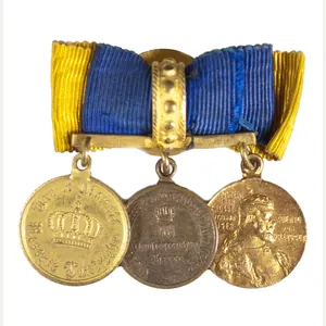 Miniature medals on buttonhole device (1871 Kriegsdenkmünze, Zentenaren medaille + …