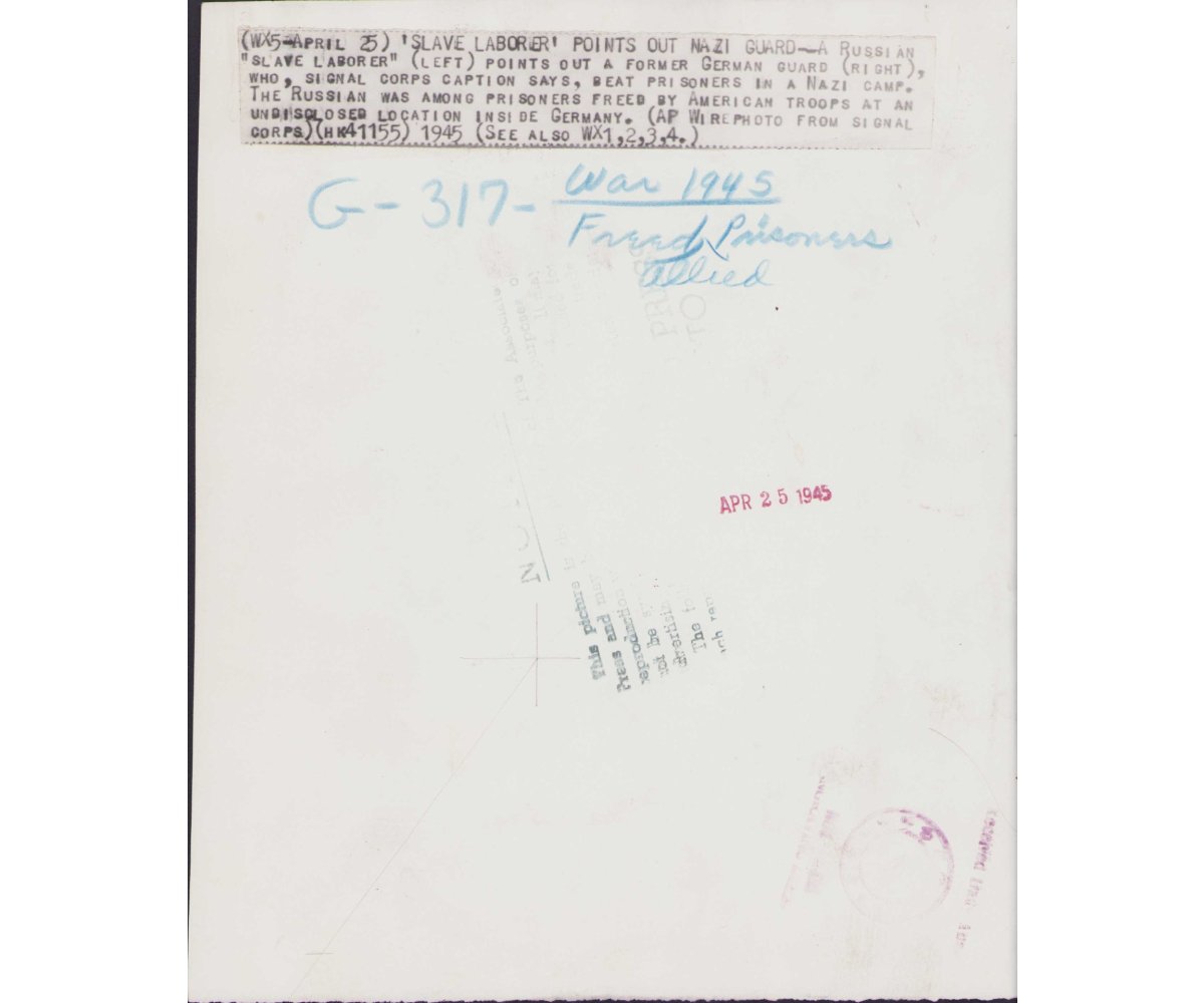 'Pointing out Nazi Guard' US Press Photo — image 2