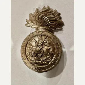 Northumberland Fusiliers plastic economy badge.