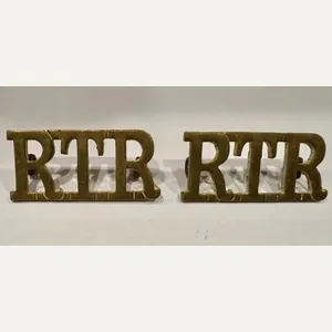 A Pair of RTR larger metal shoulder titles