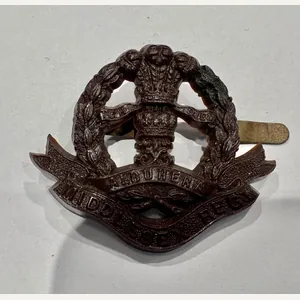 Plastic Economy Cap Badge Middlesex Regiment
