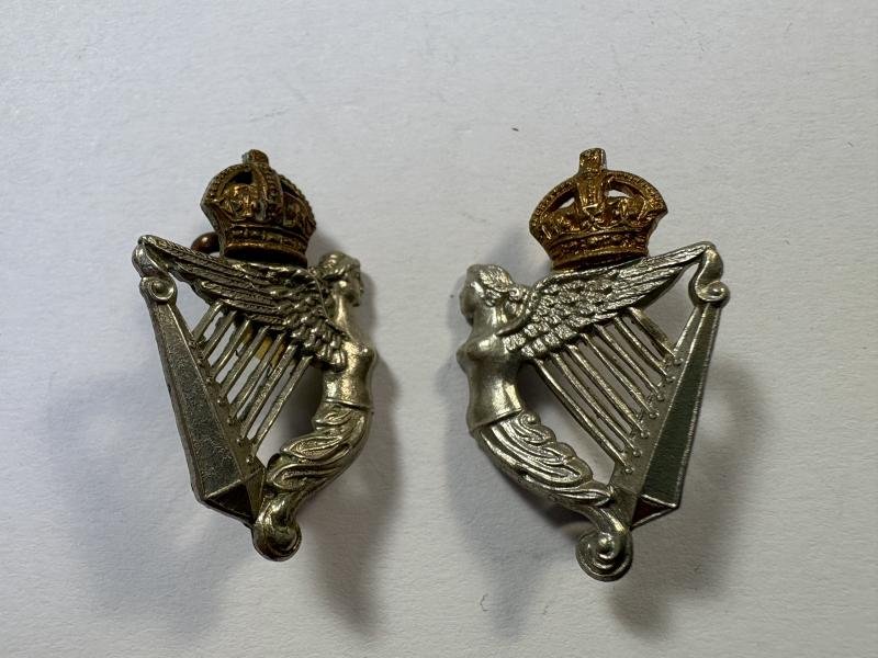 A pair of 8th Royal Irish K.C. collar badges