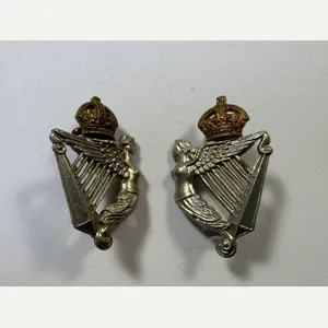 A pair of 8th Royal Irish K.C. collar badges