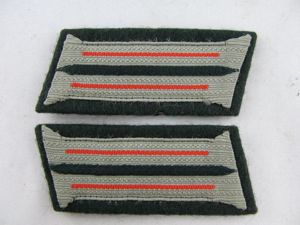 Paire de litzen d'artillerie sur support