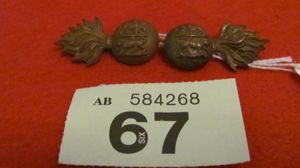 Pair WW1 R Dublin Fusilers collar badges